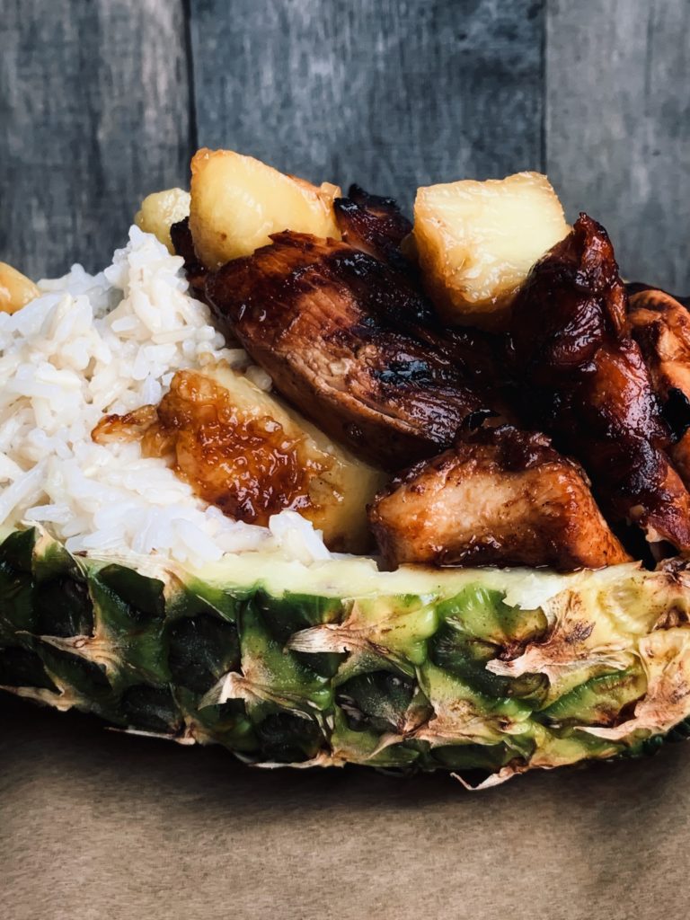 pineapple chicken in a pineapple